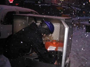 Helen loads up cargo at 5:30am, during one of last winter's worst snowstorm.