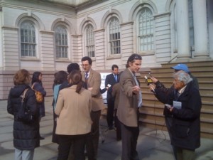 The pre-hearing scene outside City Hall