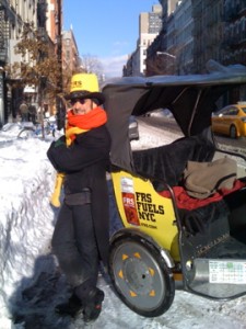 Neither snow nor rain nor heat nor gloom of night stays this pedicab driver from his appointed rounds.
